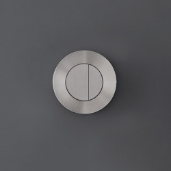Дизайнерская смывная панель в для инсталляции форме круглой кнопки из нержавеющей стали CEA Design